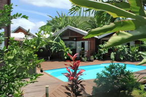 Bungalow charmant à Vincendo avec piscine partagée